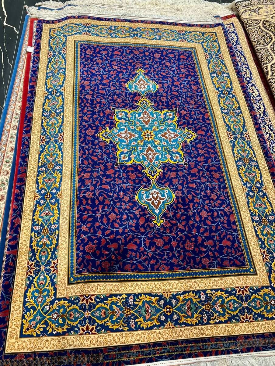 Contemporary Persian Area Rug - Full view of the hand-knotted Persian rug, featuring a rich blue background with floral motifs and a central medallion, perfect for adding elegance to any space.